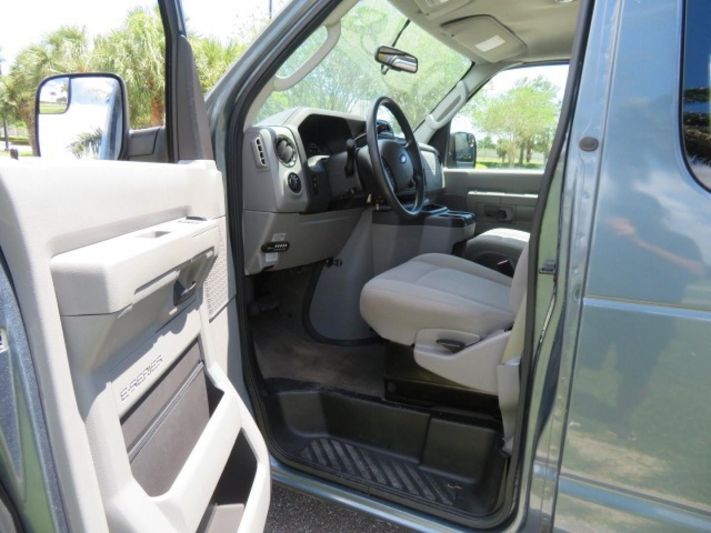 2013 Dark Blue /Gray Ford E-Series Wagon XLT (1FMNE1BW4DD) with an 4.6L V8 engine, Automatic transmission, located at 4301 Oak Circle #19, Boca Raton, FL, 33431, (954) 561-2499, 26.388861, -80.084038 - You are looking at a Gorgeous 2013 Ford E150 XLT Handicap Wheelchair Conversion Van with 22K Original Miles, Tie Down System, Power Electric VMI Side Entry Wheelchair Lift, Back Up Camera, Factory Navigation and Much Much More. This van is Awesome. This is a Nice Rust Free Van with a Clean Carfax, C - Photo#69